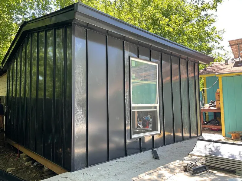 Black standing seam metal wall panels for Roof Inspection in Vashon